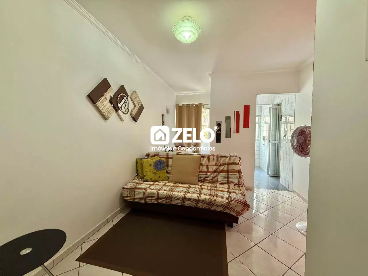 Sala de apartamento bem iluminada